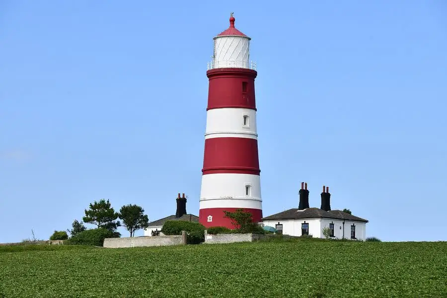 The red and white Happisburgh Lighthouse
